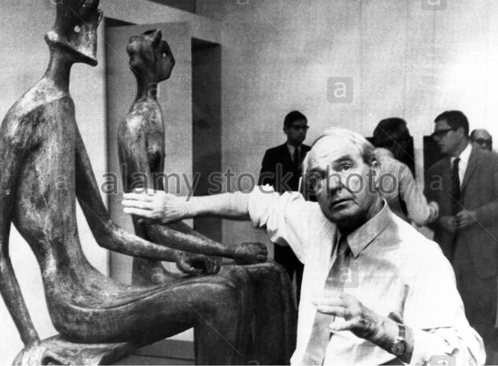 Henry Moore, (1898-1986), explaining his sculpture 'King and Queen' at Dusseldorf's Art Hall, Germany, July