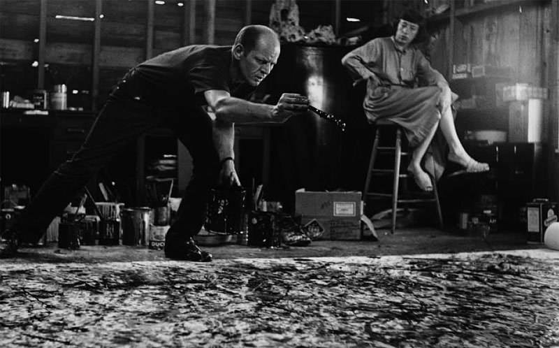 05. Jackson Pollock at work - behind his wife, artist Lee Krasner 1944